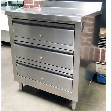 stainless steel cabinets and drawers alongside restaurant stove|stainless steel cabinets for sale.